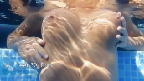 Underwater undressing of beautiful boobs