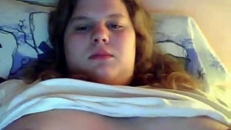 Adorable BBW teen plays with her huge tits for me on