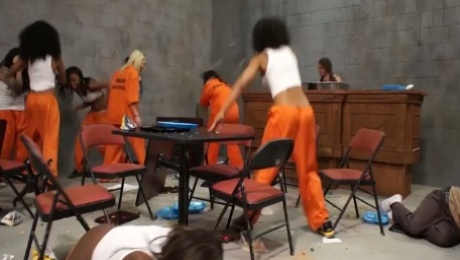 Black cop Bella Moretti desires to eat the hot prisoner Porshe Carrera's pussy