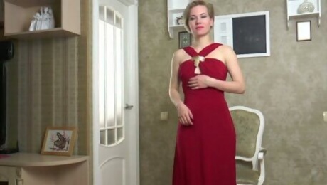Delicious milf in red dress Lisa Young gets naked and masturbates twat