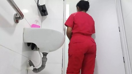 Big ass nurse recorded in office bathroom